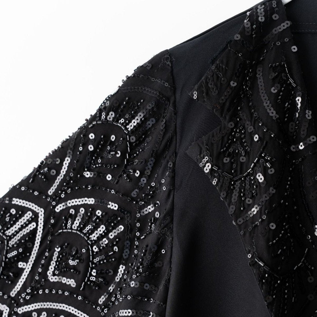 Embroidered V-neckline border detail on black open abaya with matte body fabric