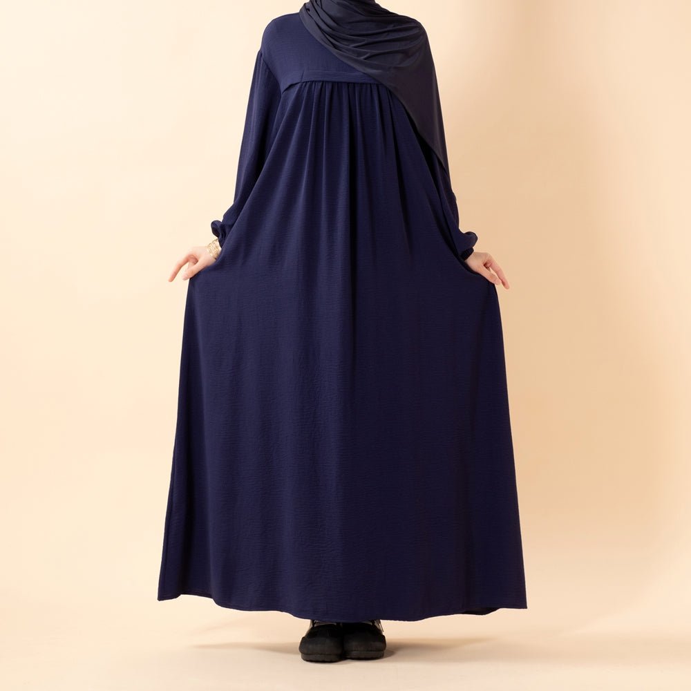 Full-length front view of grey crepe abaya for Umrah
