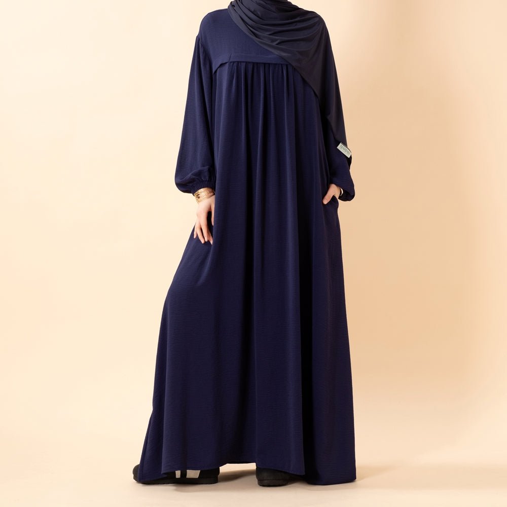 Close-up of hidden chest pocket on crepe abaya