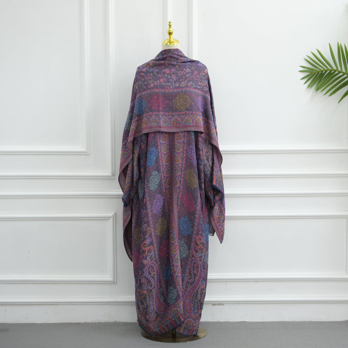 Modest two-piece abaya and hijab set styled for formal dinner