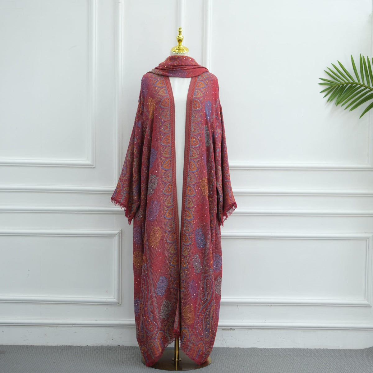 Hem drape of flowing jacquard cardigan abaya