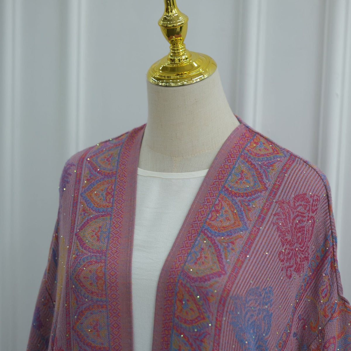 Matching jacquard hijab styled with coordinated open abaya