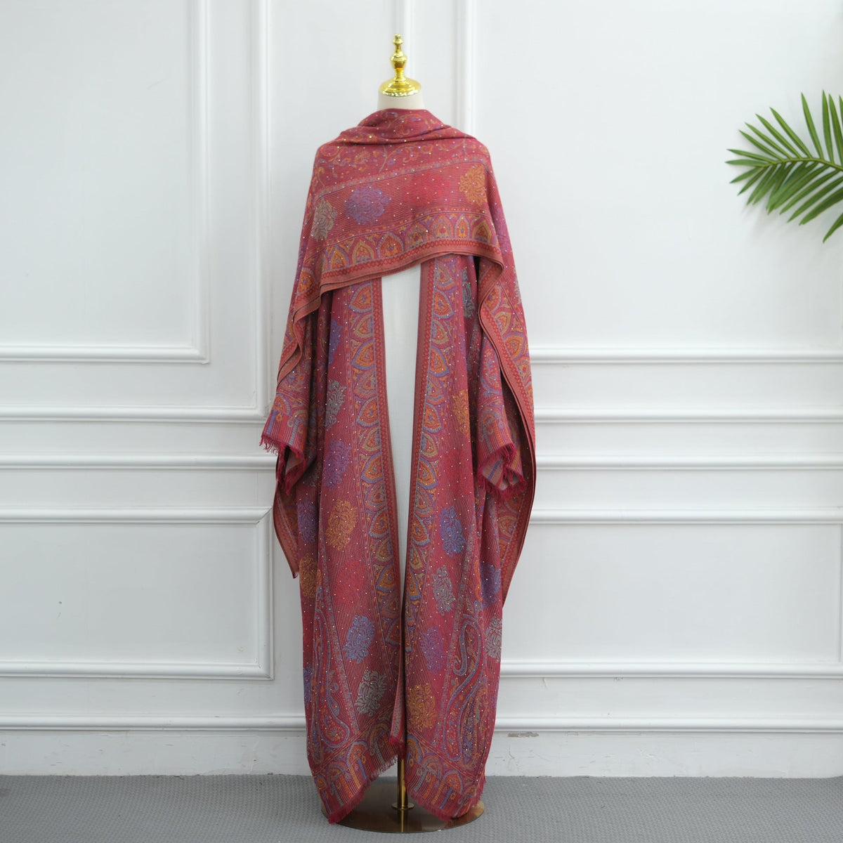Walking shot of open-front jacquard cardigan abaya