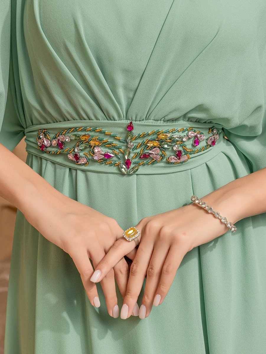 Elegant Mint Green V - Neck Swing Flowy A - Line Maxi Dress with Bell Sleeves & Embellished Belt Abaya. (MA189) - Mariam's Collection