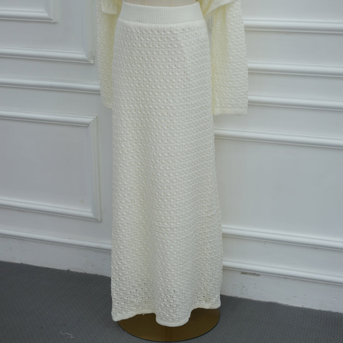 Ivory colourway of hollow-out crochet knit co-ord set styled for occasion wear