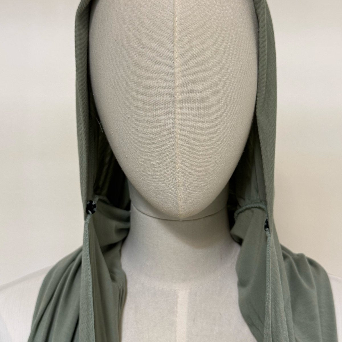 Full coverage back view of pleated cotton modal hijab liner