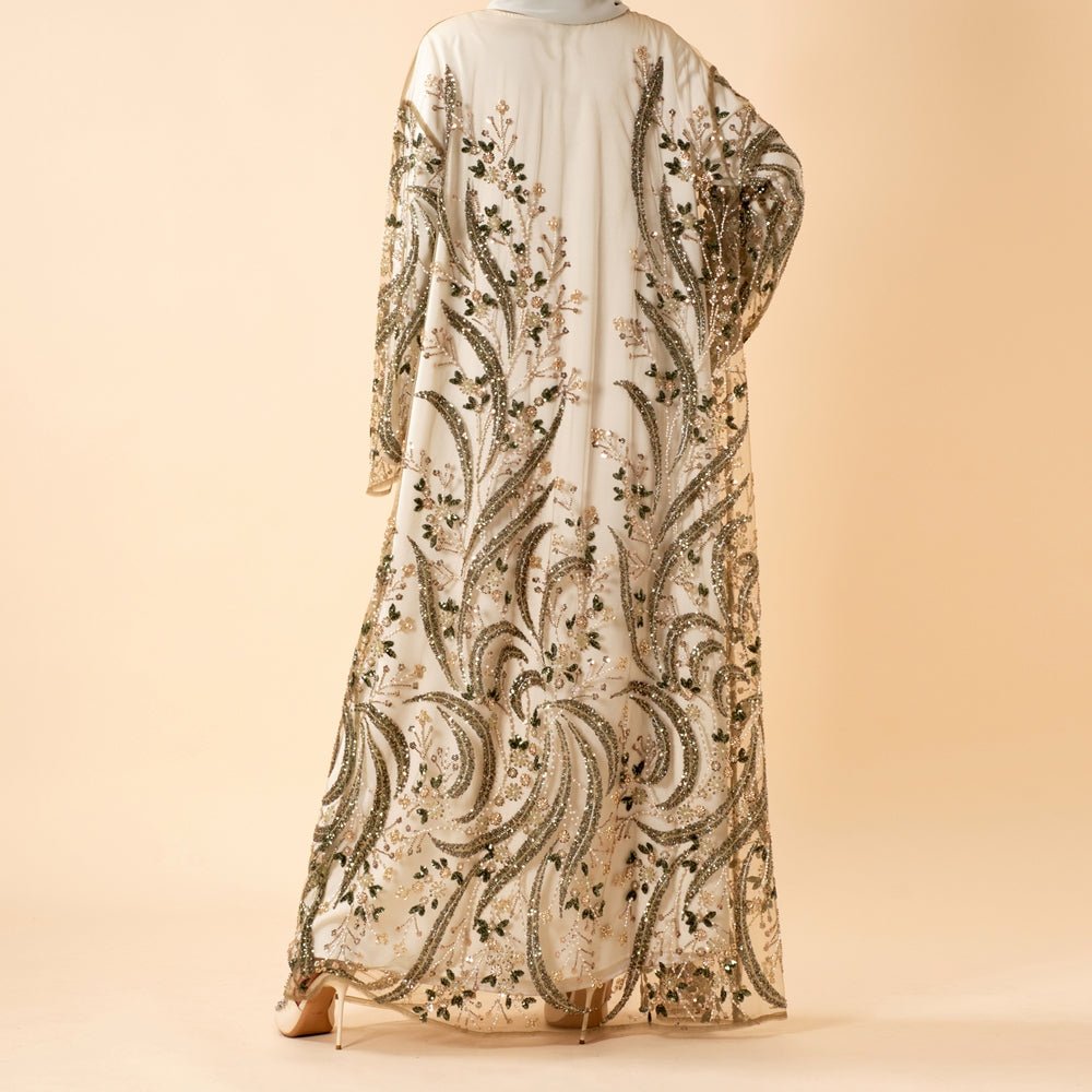 Close-up of dimensional beadwork and sequin embroidery on open abaya panel