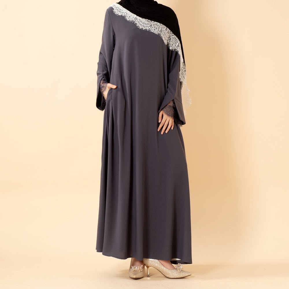 Umbrella-cut hem detail of luxury Nida abaya in graceful movement