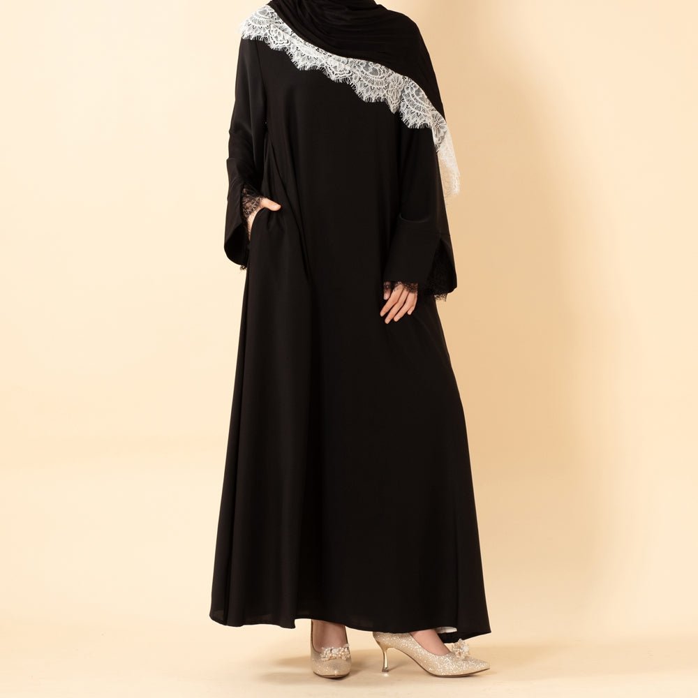 Side view of flowing Nida umbrella abaya with concealed pocket