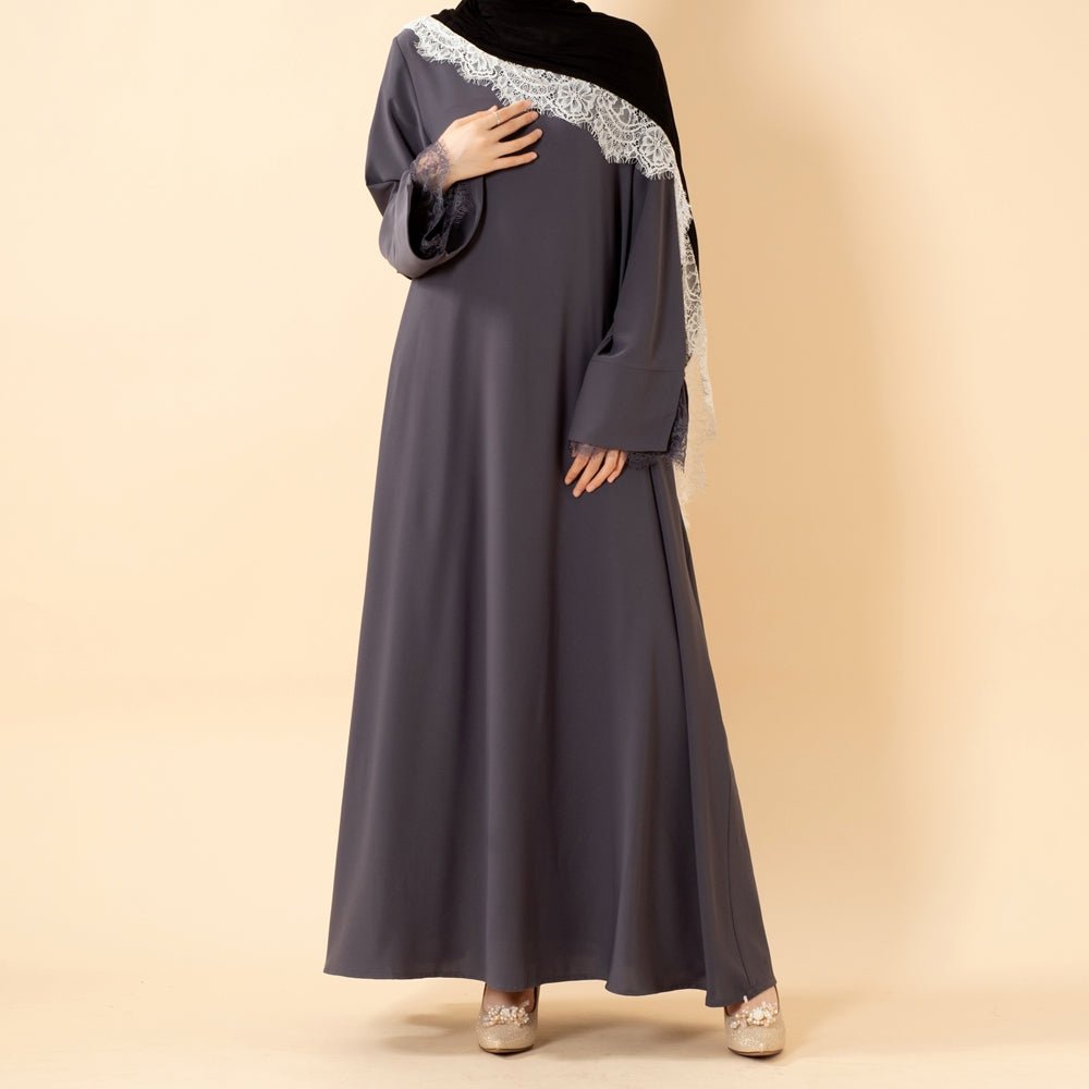 Wide sleeve with lace cuff trim on flowing Nida modest dress