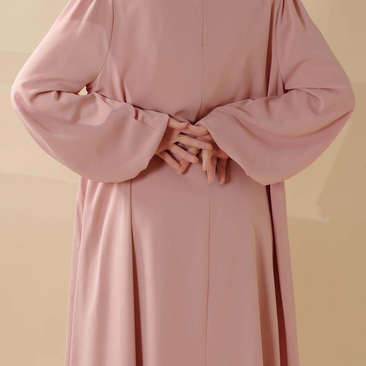 Full-length modest closed abaya in soft pastel colour