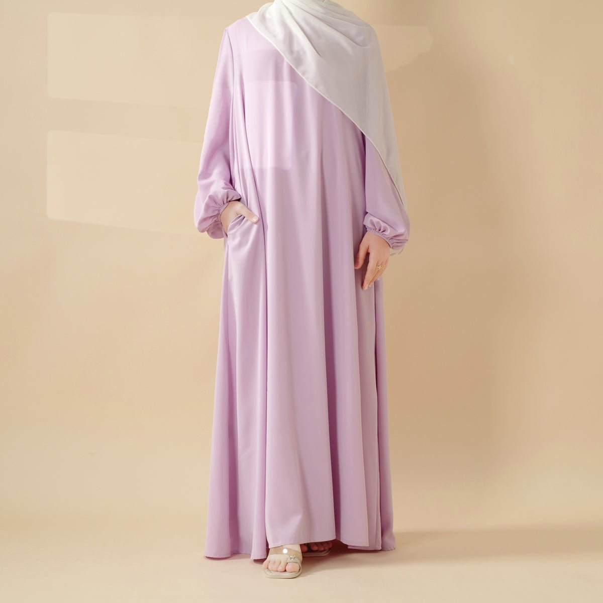 Gathered shoulder detail on candy color pleated abaya