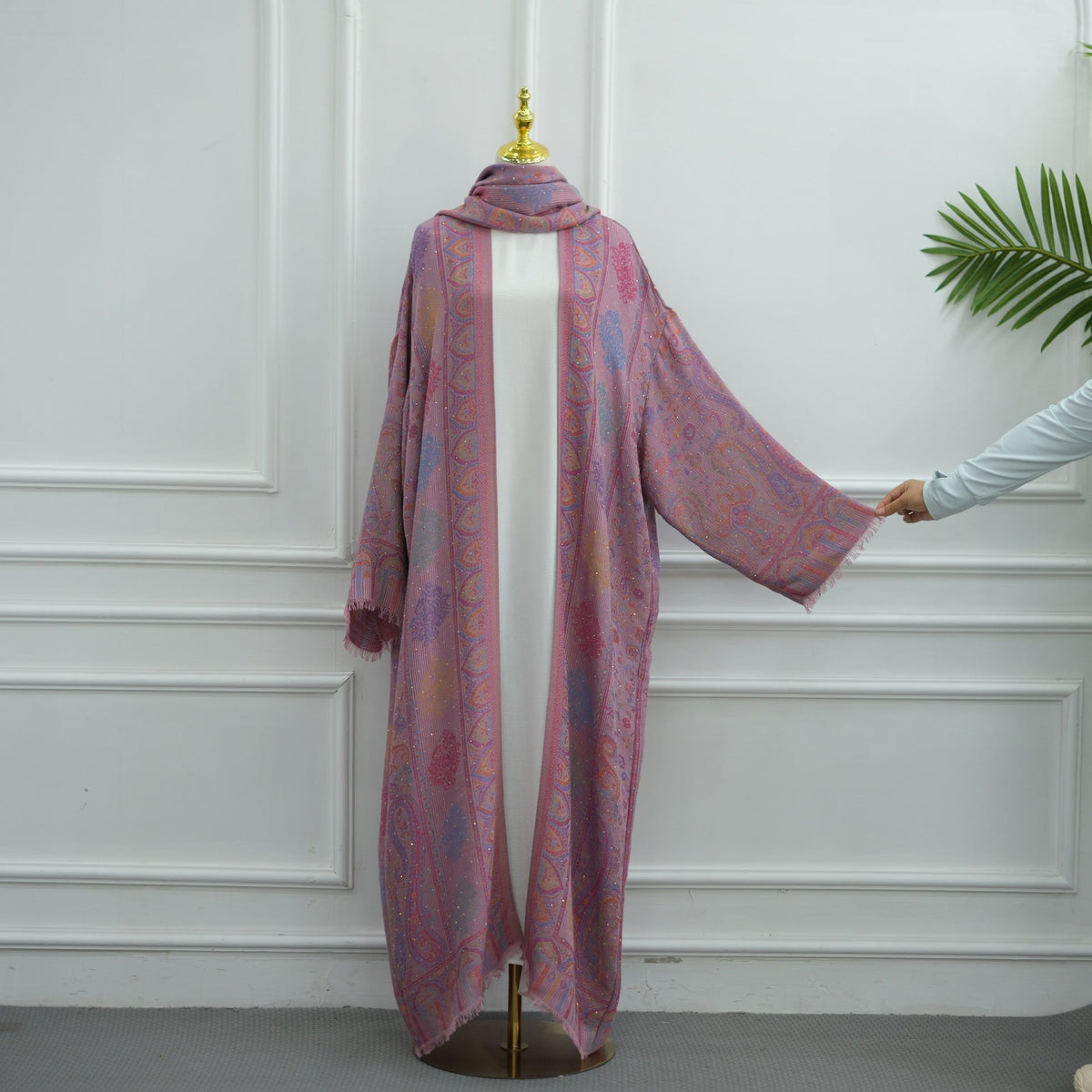 Textured jacquard weave detail of modest cardigan abaya