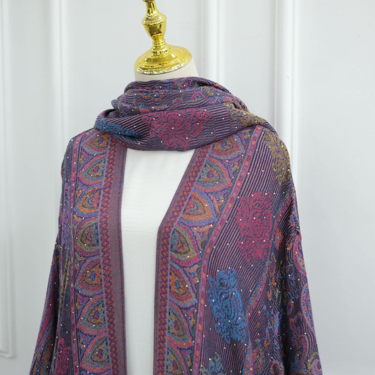 Rhinestone sparkle detail on textured jacquard weave