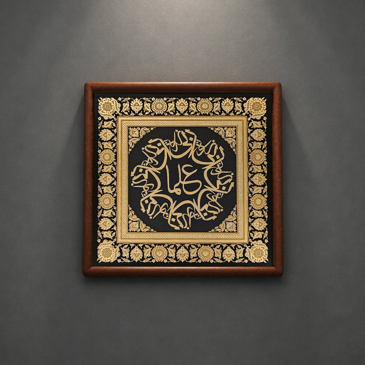 Tabletop display of copper relief Islamic art on office desk