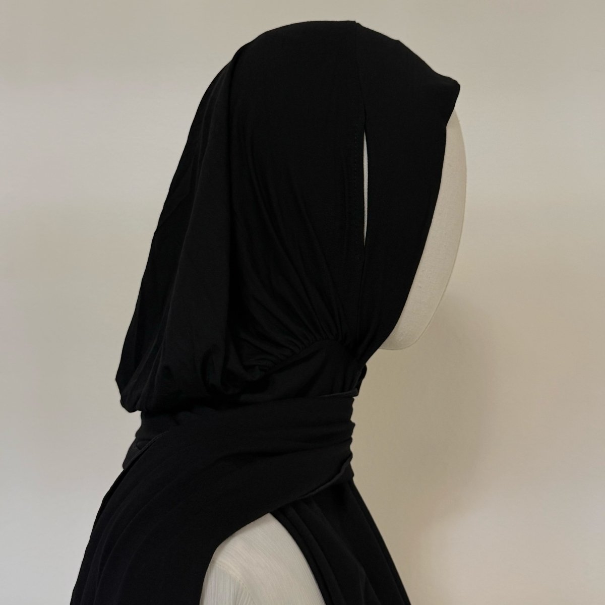 Three-quarter profile view of cotton modal hijab liner