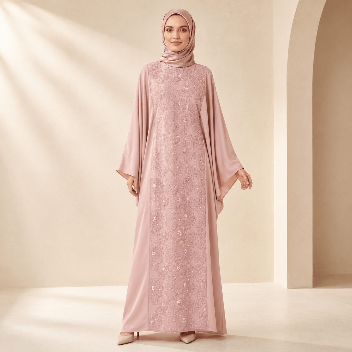 Detail shot of premium satin fabric sheen on luxury embroidered abaya