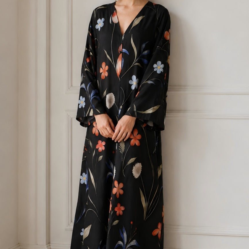 Close-up of painterly tulip and iris watercolour print on lustrous abaya fabric